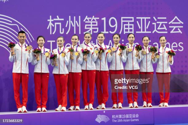 Gold medalists Team China pose during the medal ceremony for the Artistic Swimming - Team Free Routine match on day 15 of the 19th Asian Games at...
