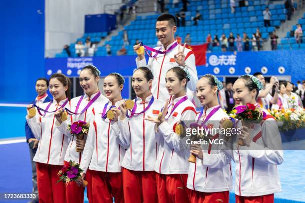 Gold medalists Team China pose during the medal ceremony for the Artistic Swimming - Team Free Routine match on day 15 of the 19th Asian Games at...