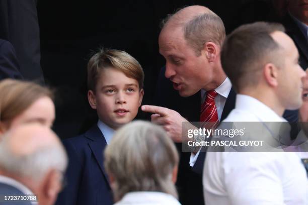 Patron of the Welsh Rugby Union Britain's Prince William, Prince of Wales talks with his son Prince George of Wales during the France 2023 Rugby...