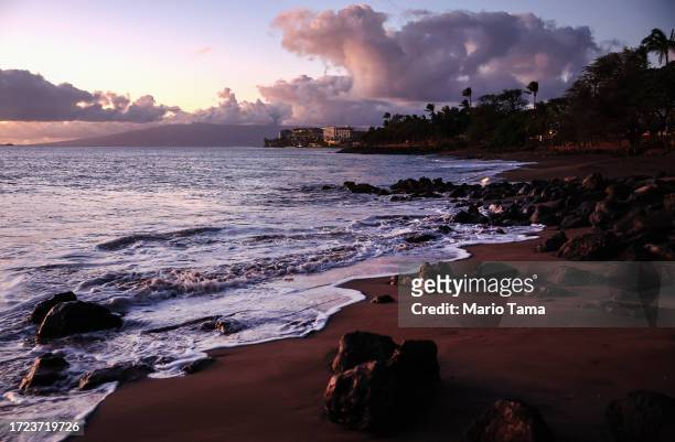 Waves roll in with resort properties in the distance nearly two months after a devastating wildfire on October 07, 2023 in Lahaina, Hawaii. The...