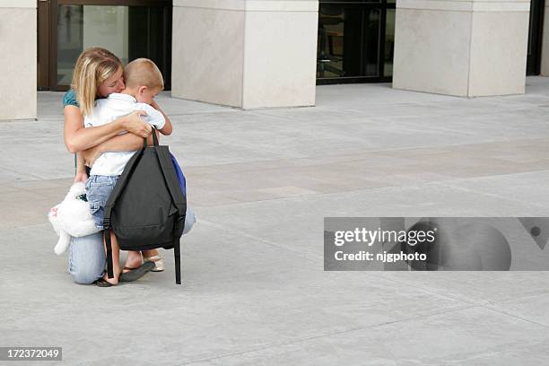 good-bye-hug - children divorce stock-fotos und bilder
