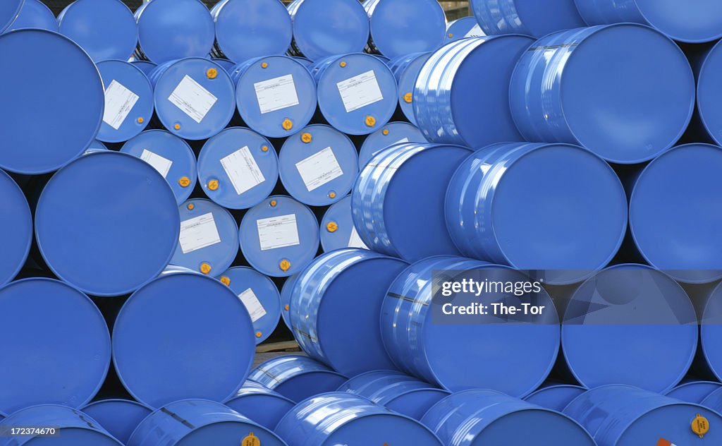 A warehouse full of blue Hugh barrels 