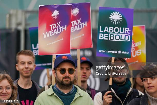 Green New Deal Rising activists hold a climate rally outside the ACC Convention Centre on day one of the Labour Party conference on October 08, 2023...