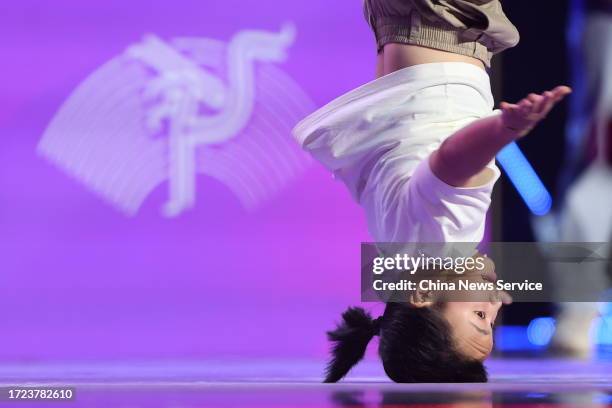 Liu Qingyi of Team China competes in the Breaking - Women's Gold Medal Battle on day 14 of the 19th Asian Games at Gongshu Canal Sports Park...