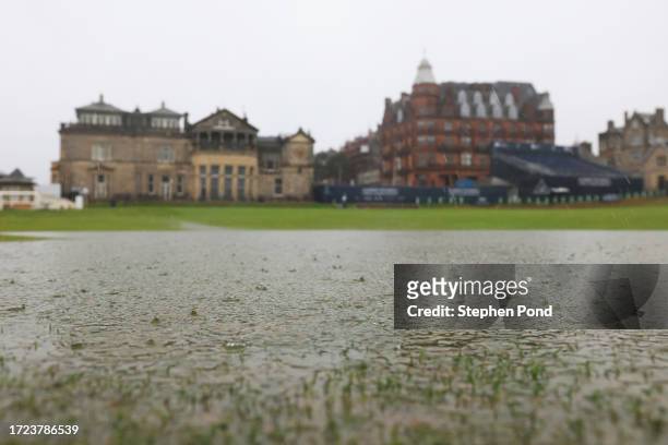 View of the flooded first hole fairway in front of The Royal and Ancient Clubhouse, during rainfall ahead of Round Three on during Day Four of the...