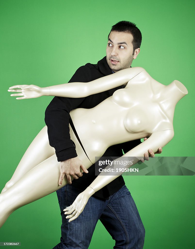 Bizzarre Man with Broken Mannequin