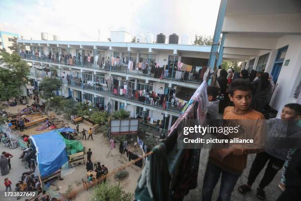 October 2023, Palestinian Territories, Khan Yunis: Displaced Palestinian from Gaza City seek refuge in UN school in Khan Yunis, as fighting between...