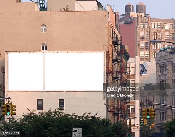 blank ad billboard space in manhattan - new york stockfoto's en -beelden