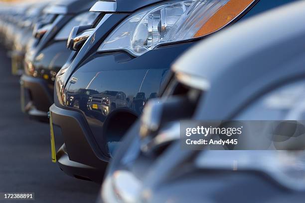 close up of front bumpers of new cars - cars parked in a row stock pictures, royalty-free photos & images