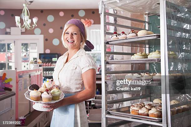 woman working in bakery - cupcake stock pictures, royalty-free photos & images
