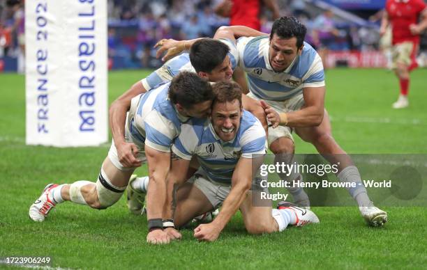 Nicolas Sanchez of Argentina celebrates with team mates after scoring their second try during the Rugby World Cup France 2023 Quarter Final match...