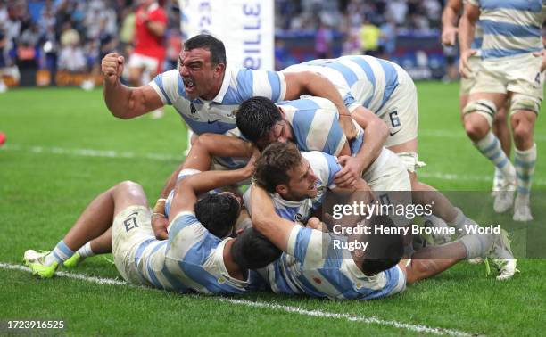 Nicolas Sanchez of Argentina celebrates with team mates after scoring their second try during the Rugby World Cup France 2023 Quarter Final match...