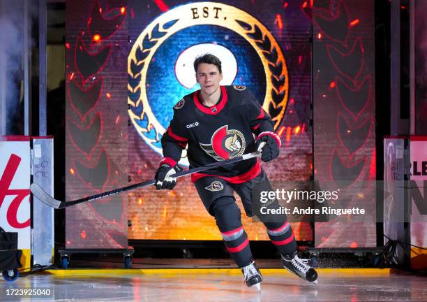 Artem Zub of the Ottawa Senators steps on the for player introductions prior to the home opener against the Philadelphia Flyers at Canadian Tire...