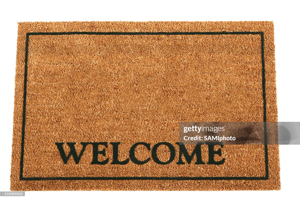 Brown doormat with Welcome and a rectangular frame