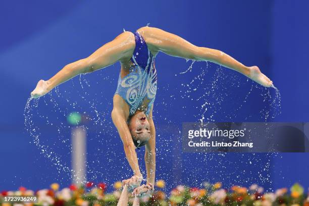 Team Kazakhstan perfoms during the team free routine artistic swimming competition during day 15 of the 2022 Asian Games at Hangzhou Olympic Sports...