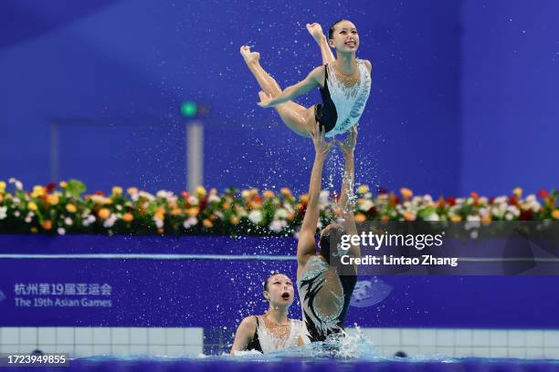 Team Japan perfoms during the team free routine artistic swimming competition during day 15 of the 2022 Asian Games at Hangzhou Olympic Sports Centre...