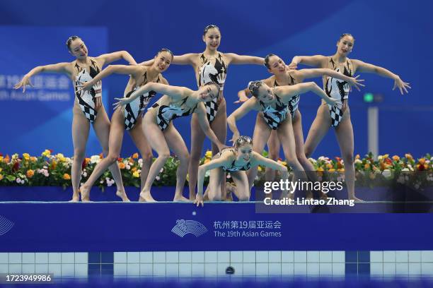 Team Japan perfoms during the team free routine artistic swimming competition during day 15 of the 2022 Asian Games at Hangzhou Olympic Sports Centre...