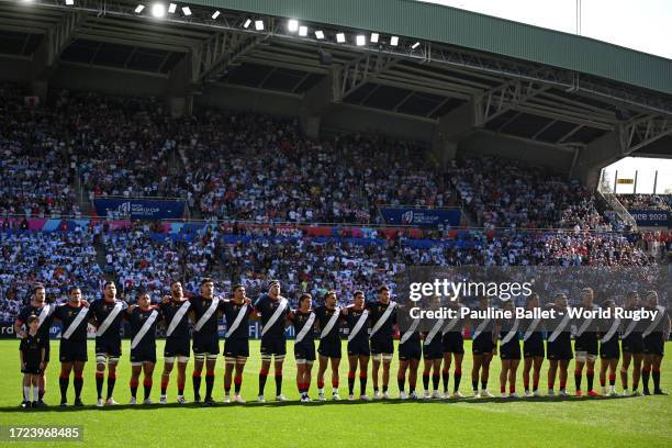 The players of Argentina line up during the National Anthems prior to the Rugby World Cup France 2023 match between Japan and Argentina at Stade de...