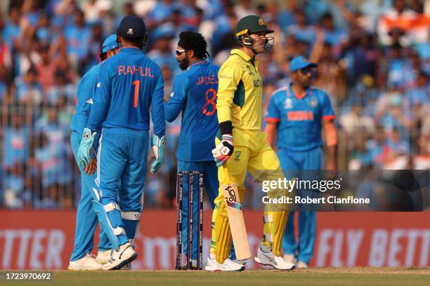 Alex Carey of Australia leaves the field after being dismissed by leg-before-wicket during the ICC Men's Cricket World Cup India 2023 between India...