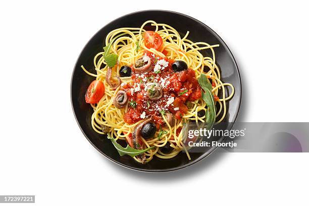 italian ingredients: spaghetti puttanesca - pasta on white plate stock pictures, royalty-free photos & images
