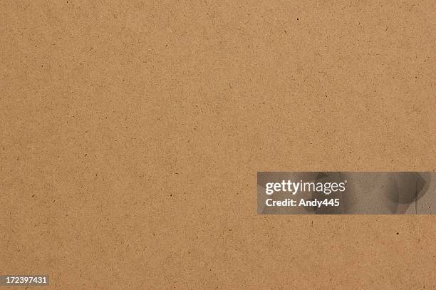 hardboard texture with tan colors - cardboard stock pictures, royalty-free photos & images