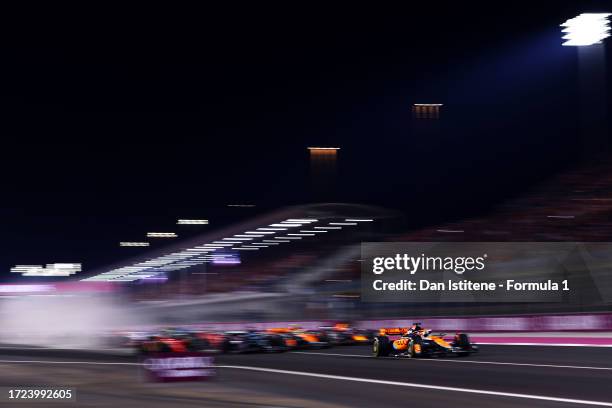 Oscar Piastri of Australia driving the McLaren MCL60 Mercedes leads the field at the start of the sprint race ahead of the F1 Grand Prix of Qatar at...