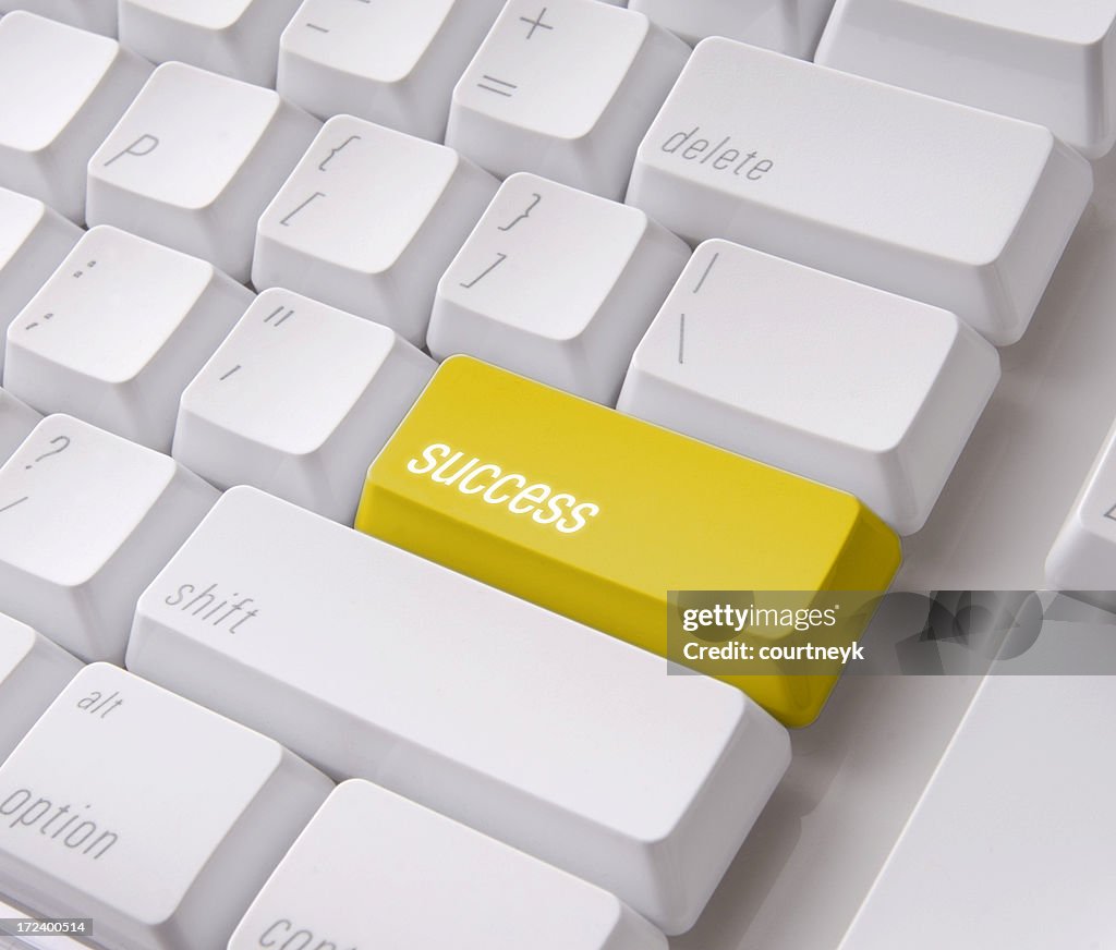 Yellow success key with clipping path