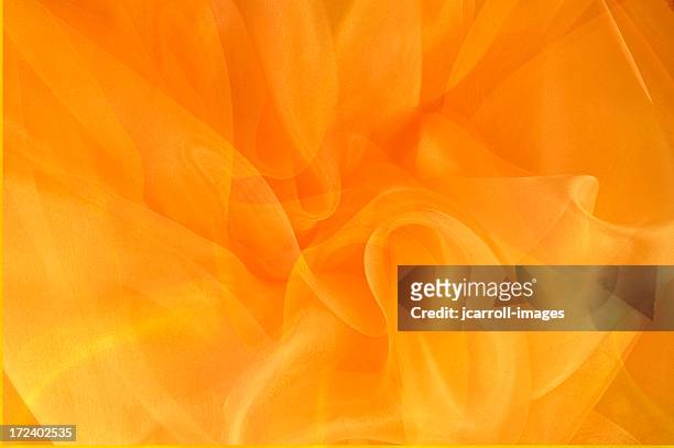 helles orange und gold swirls - orange silk background stock-fotos und bilder