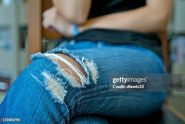 ratty fashion statement - ripped jeans stock pictures, royalty-free photos & images