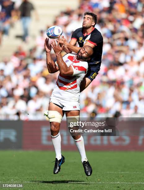 Michael Leitch of Japan and Juan Cruz Mallia of Argentina compete to catch a high ball during the Rugby World Cup France 2023 match between Japan and...