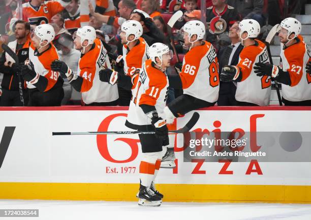 Travis Konecny of the Philadelphia Flyers celebrates his first period goal against the Ottawa Senators at Canadian Tire Centre on October 14, 2023 in...