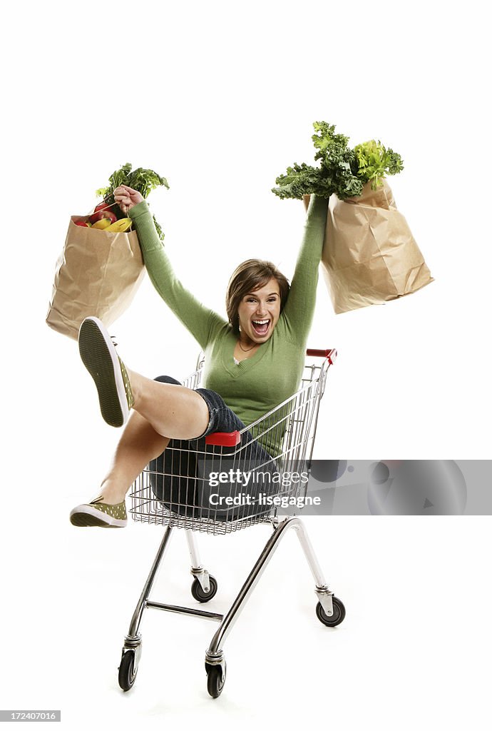 Happy Young woman with her grocery bags