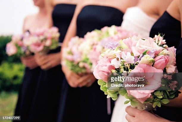 bridesmaids with flowers - flower dress stock pictures, royalty-free photos & images
