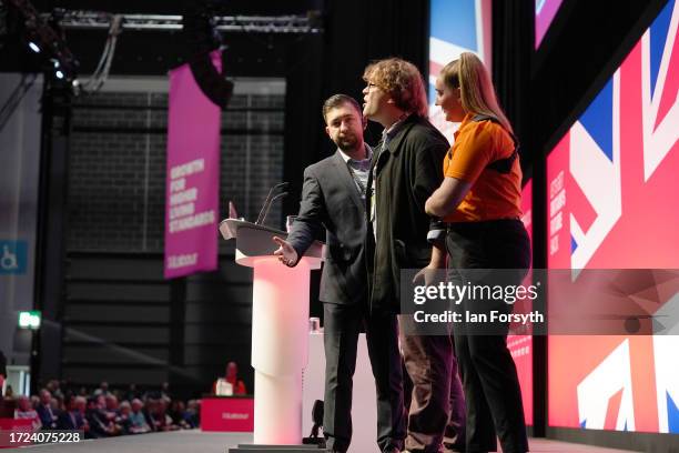 An uninvited speaker is removed from the podium during day one of the annual Labour party conference on October 08, 2023 in Liverpool, England. The...