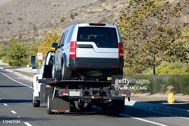 tow truck - towing stock pictures, royalty-free photos & images