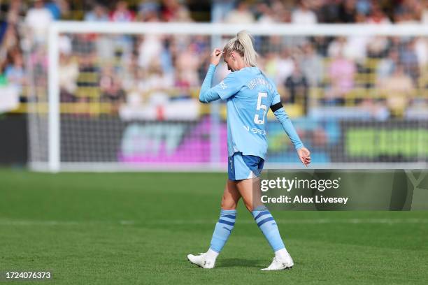 Alex Greenwood of Manchester City leaves the pitch after being shown a red card during the Barclays Women´s Super League match between Manchester...