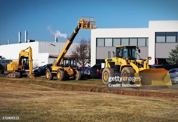 moderna maquinaria pesada - herramientas de construcción fotografías e imágenes de stock