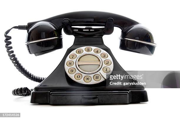 schwarz retro telefon auf weiß - altes telefon stock-fotos und bilder