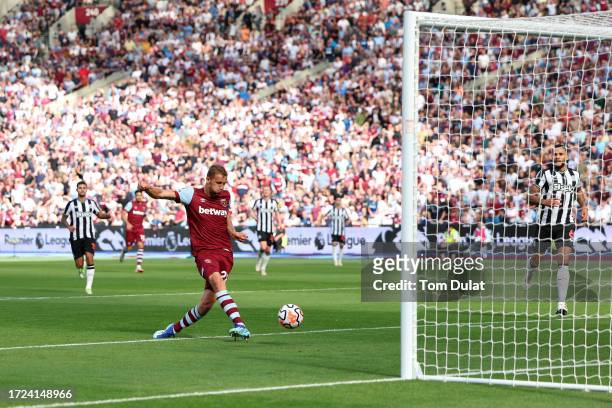 Tomas Soucek of West Ham United scores their sides first goal during the Premier League match between West Ham United and Newcastle United at London...