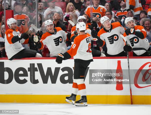 Cam York of the Philadelphia Flyers celebrates his second period goal against the Ottawa Senators with teammates at the players' bench at Canadian...