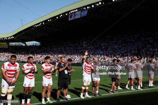 The players of Japan show their appreciation to the fans at full-time following the Rugby World Cup France 2023 match between Japan and Argentina at...