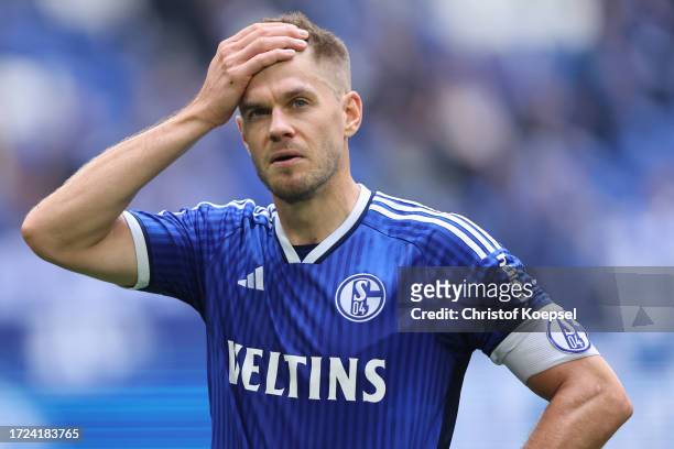 Simon Terodde of FC Schalke 04 looks dejected after losing 1-2 the Second Bundesliga match between FC Schalke 04 and Hertha BSC at Veltins Arena on...