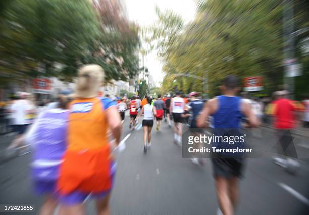 marathon runners in motion - marathon new york stockfoto's en -beelden