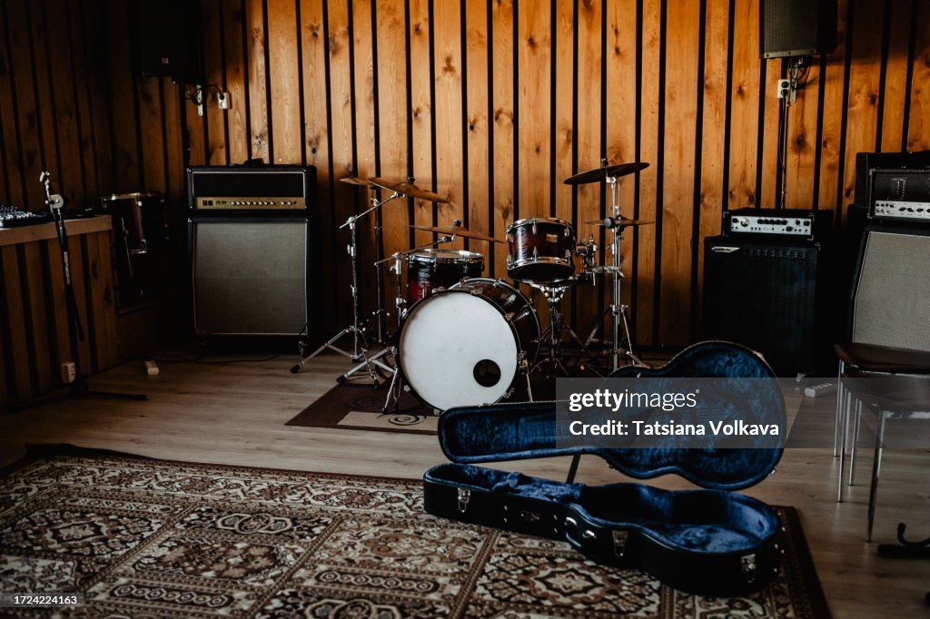 Photo of ensemble of instruments and equipment in recording studio
