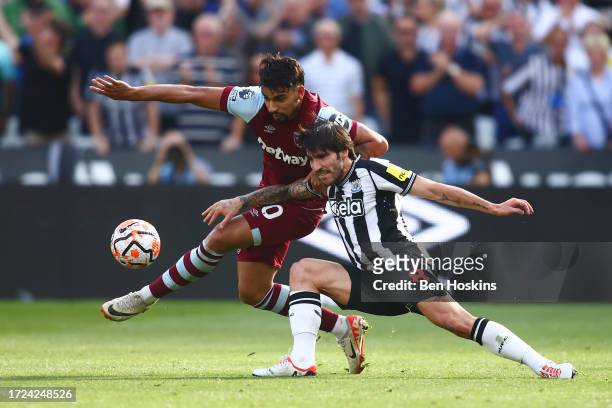Lucas Paqueta of West Ham United battles for possession with Sandro Tonali of Newcastle United during the Premier League match between West Ham...