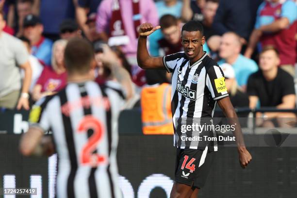 Alexander Isak of Newcastle United celebrates after scoring their sides second goal during the Premier League match between West Ham United and...