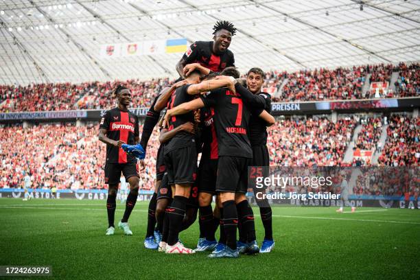Jeremie Frimpong of Leverkusen celebrates after scoring his teams second goal during the Bundesliga match between Bayer 04 Leverkusen and 1. FC Köln...