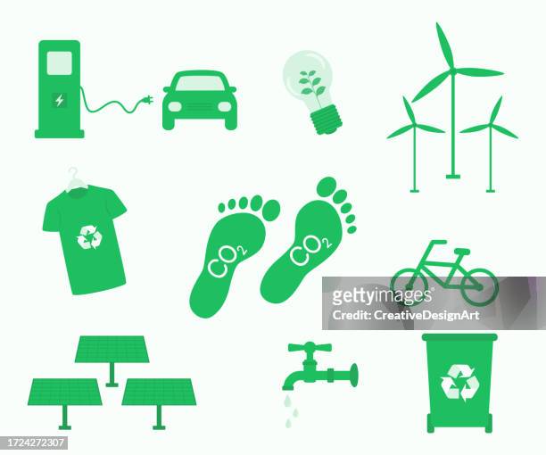 environmental icons for carbon footprint reduction. solar panels, wind turbines, recycling, alternative fuel vehicles and water conservation for reducing carbon footprint - carbon footprint reduction stock illustrations