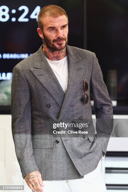 David Beckham is given a tour of the Alpine F1 garage prior to the F1 Grand Prix of Qatar at Lusail International Circuit on October 08, 2023 in...