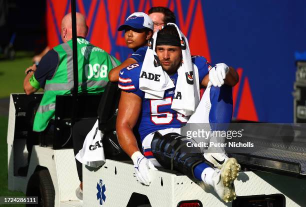 Matt Milano of the Buffalo Bills leaves the pitch after suffering an injury in the first Quarter during the NFL Match between Jacksonville Jaguars...